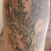 Tattoo of woman with long hear and shooter