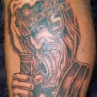 Tattoo of wise warrior with long beard