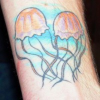 Two nice jellyfishes hand tattoo