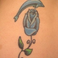 Water animal tattoo with dolphin and rose in blue color