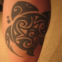 Tribal black turtle leg tattoo
