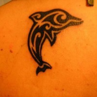 Water animal tattoo with tribal dolphin