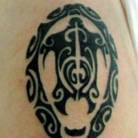 Small water animal tattoo in tribal style