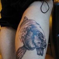 Big water animal tattoo on thigh