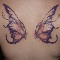 Purple butterfly wings tattoo on back