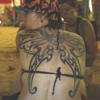 Butterfly wings tattoo on back