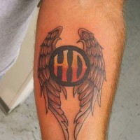 Wings tattoo with abbreviation on hand