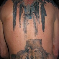 Tattoo with wolves play on back