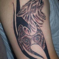 Tattoo with sad wolves howling