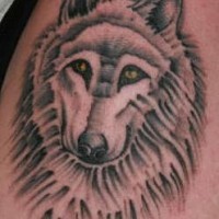 Good wolf tattoo with yellow eyes