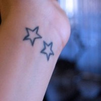 Two stars on wrist