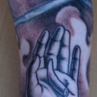 Claw in hand full hand coloured tattoo