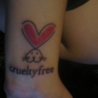 Little bunny on wrist tattoo