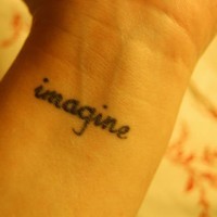 Imagine little inner wrist tattoo