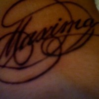 Calligraphic tattoo on wrist