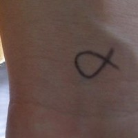 Ichthys little wrist tattoo