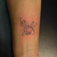 Playboy tattoo on inner side of hand