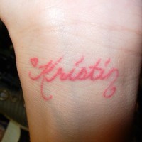 Pink ink tattoo