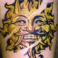 Yellow sun demon tattoo