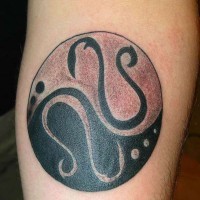 Round yin yang tattoo with monogram