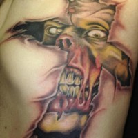 Tatouage zombie brise à travers la peau