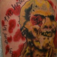 Tatuaje la cabeza del zombi con la inscripción
