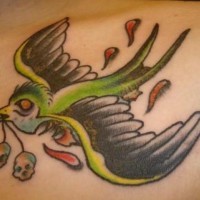 Zombie bird with sculls tattoo