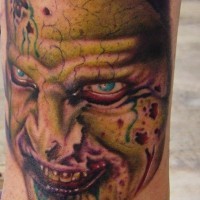 Colored zombie face tattoo