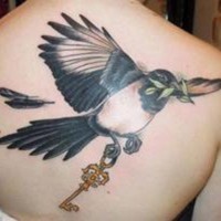 Tattoo bird and key