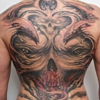 Tattoo on his back on the demonic theme