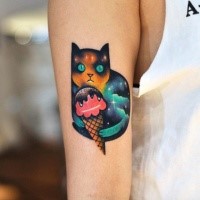 Tattoo painted by David cote on arm of cat with ice-cream