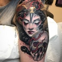 Tattoo painted by Jenna Kerr in new school style upper arm tattoo of demonic woman with skull