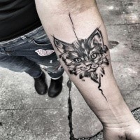 Tattoo sketch designed by Inez Janiak of cute cat head on forearm