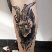 Terrifying blackwork style leg tattoo of devils skull by Michele Zingales