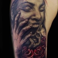 Terrifying  colored horror style arm tattoo of screaming woman with roses