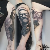 Terrifying looking arm tattoo of man monster face