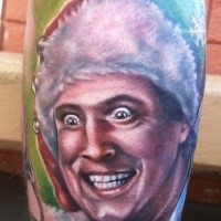 Terrifying looking colored leg tattoo of creepy man with hat