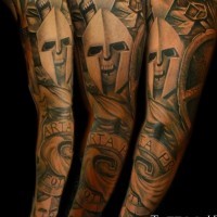 Terrifying painted colored sleeve tattoo of fantasy army with lettering