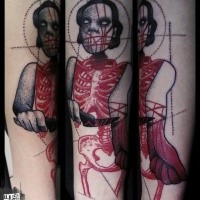 Terrifying surrealism style colored monster woman with knife tattoo on forearm