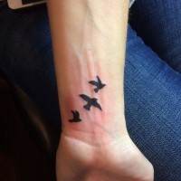 Three flying small ink birds tattoo