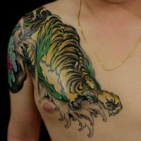 Crawling tiger  tattoo  on shoulder and chest