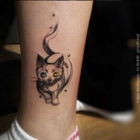 Tiny abstract style mystical cat tattoo on ankle with various colored eyes
