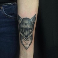 Tiny black and white abstract forearm tattoo of fox head