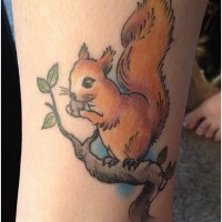 Tiny cartoon like colored cute squirrel tattoo