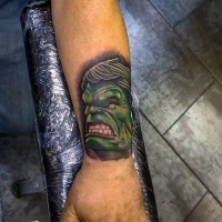 Tiny comic books style colored wrist tattoo of angry Hulk head
