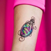 Tiny cute looking colored tattoo of magical potion