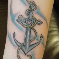 Tiny gray anchor on the wave background tattoo on shin