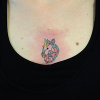 Tiny homemade like abstract tattoo on chest