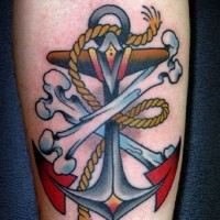 Traditional anchor and bones tattoo