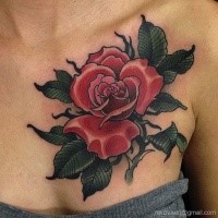 Traditional old school style detailed red rose flower big size tattoo on woman's chest